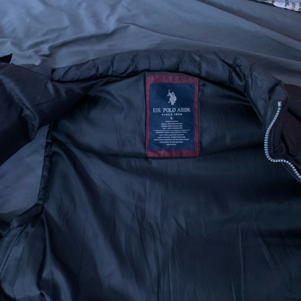 U.S. Polo Assn. Black Puffer Jacket Sleek Modern Design